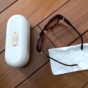 Like new Chloe tortoise sunglasses with original case and dust cloth.